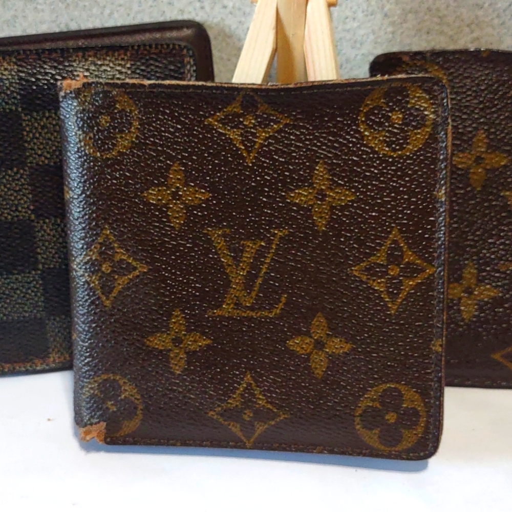LV Vintage monogram bifold wallet.